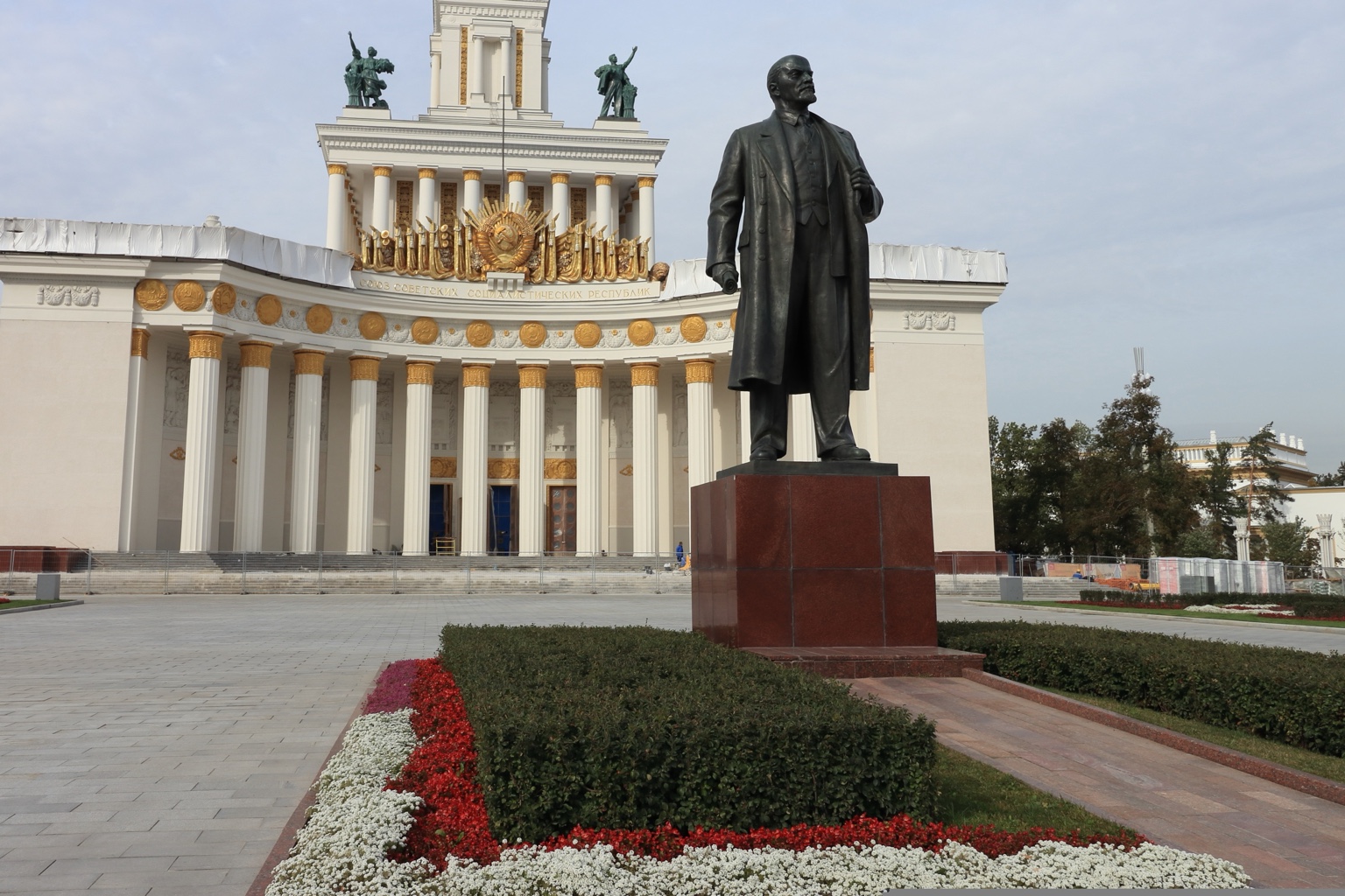 Volgograd State University campus with a statue in front